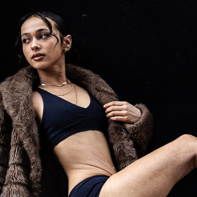 Model wearing an organic cotton navy blue bralette - You Underwear