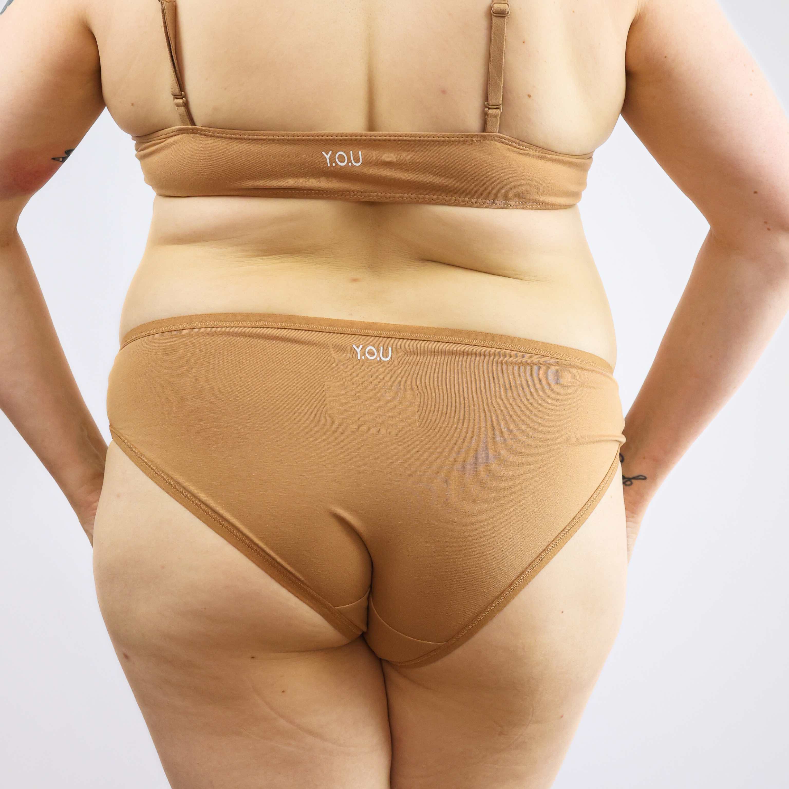 model wearing organic cotton low rise bikini almond - You Underwear