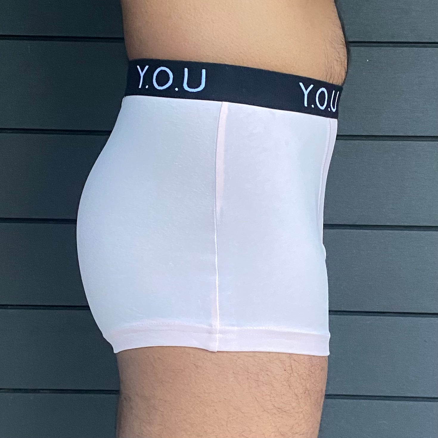 model wearing organic cotton men's hipster trunks in light pink - You Underwear