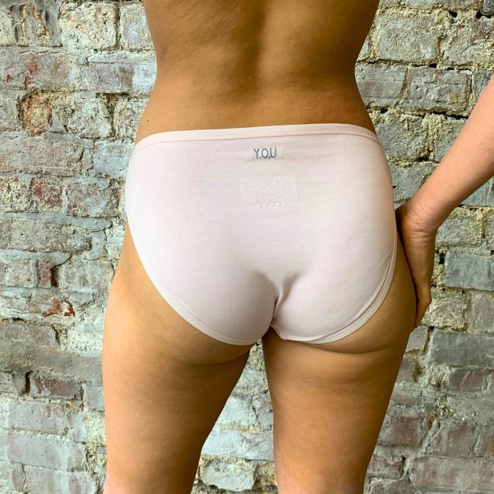 model wearing organic cotton mid rise bikini light pink - You Underwear
