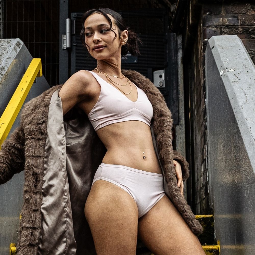 model wearing organic cotton mid rise bikini light pink - You Underwear