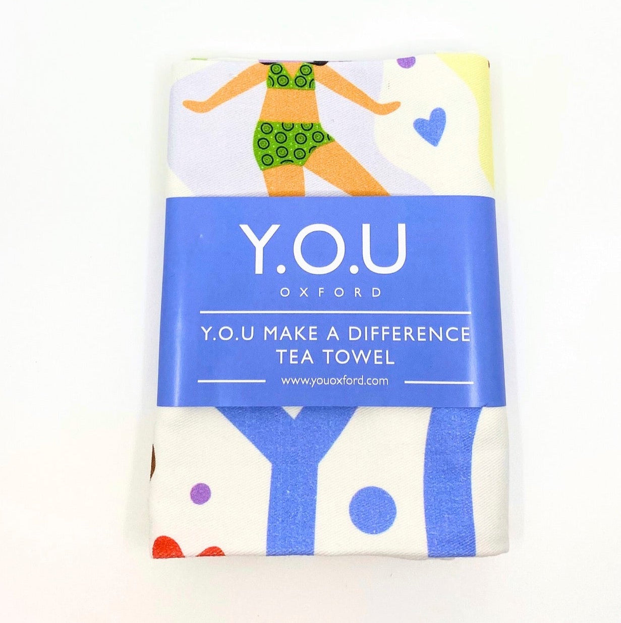 Organic cotton tea towel printed design with illustrations of different women wearing organic cotton underwear folded and wrapped - You Underwear