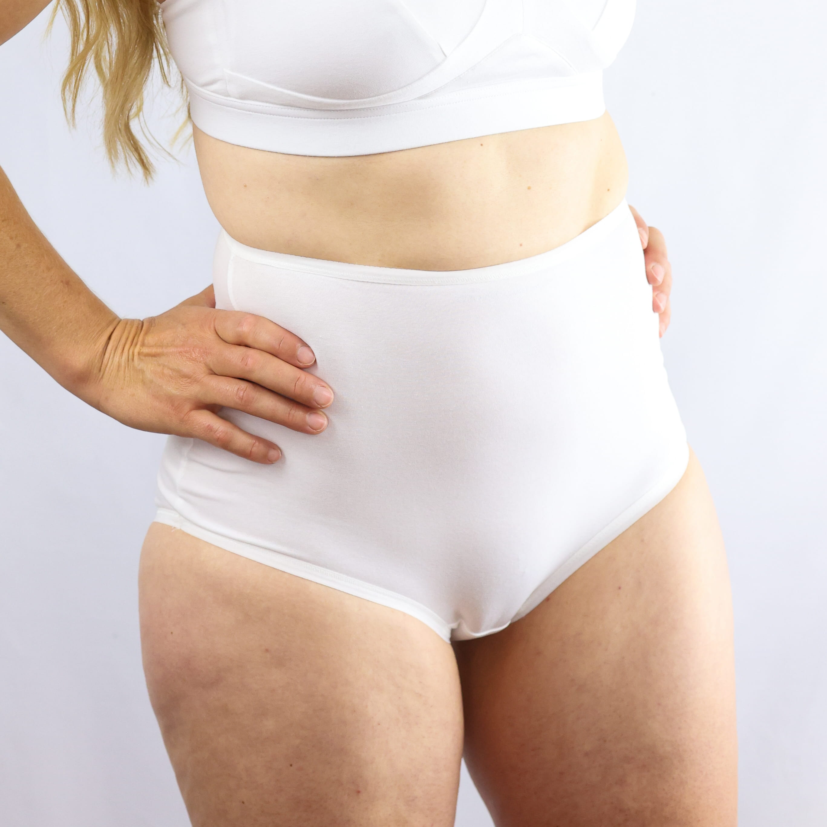 Model wearing organic cotton high waisted knickers in white- Y.O.U Underwear