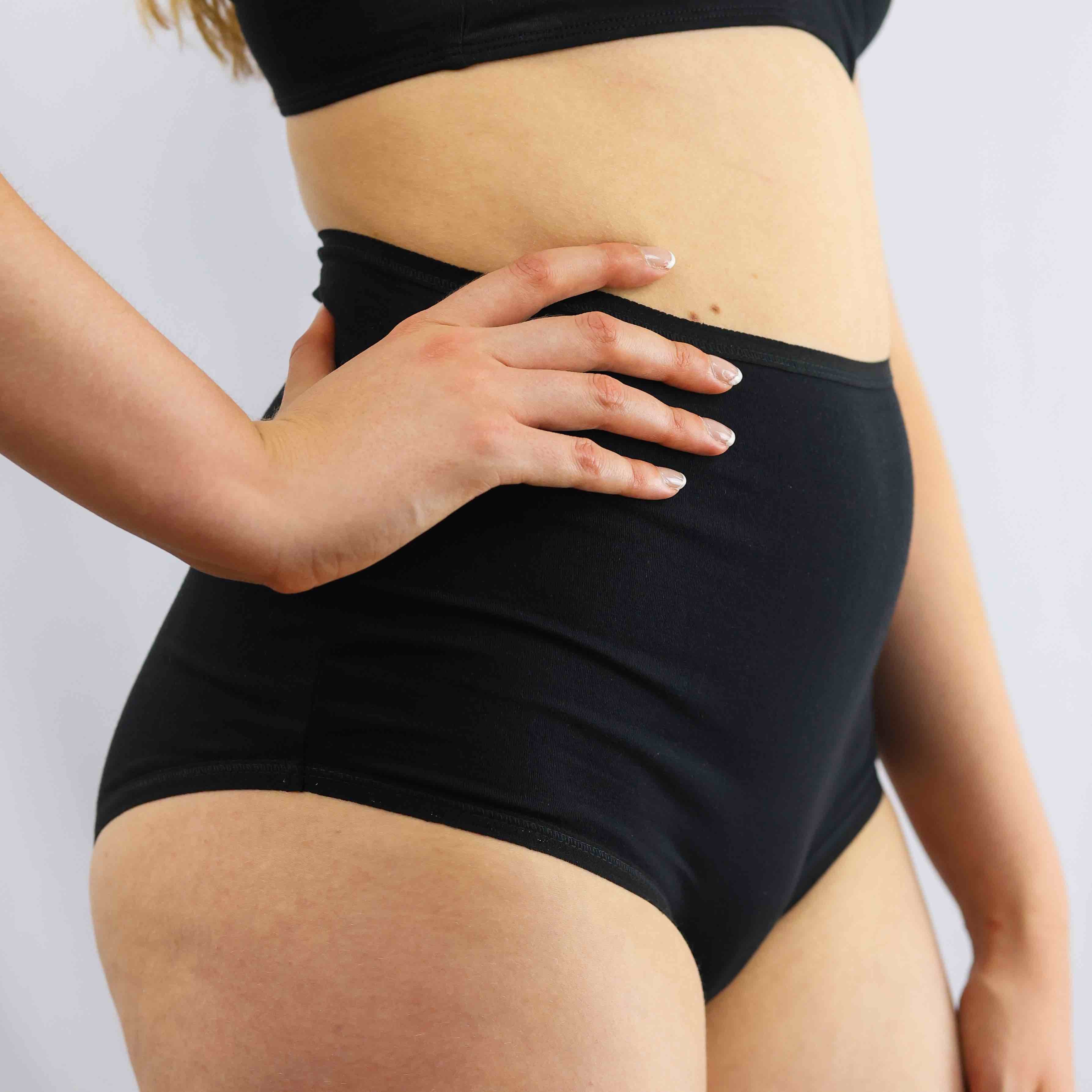 Model wearing organic cotton high waisted knickers in black - Y.O.U Underwear