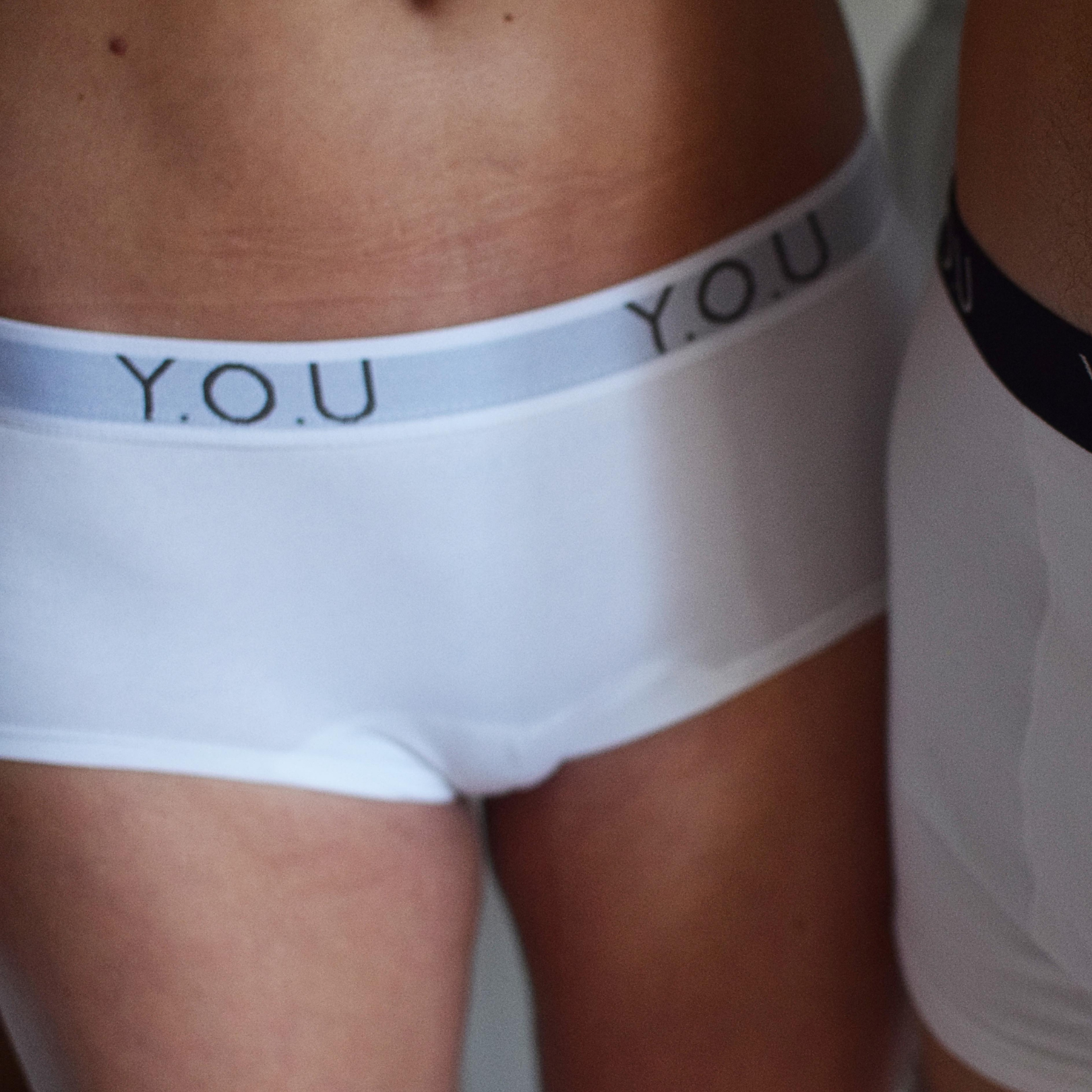 Women’s organic cotton boy shorts with Y.O.U elastic in white