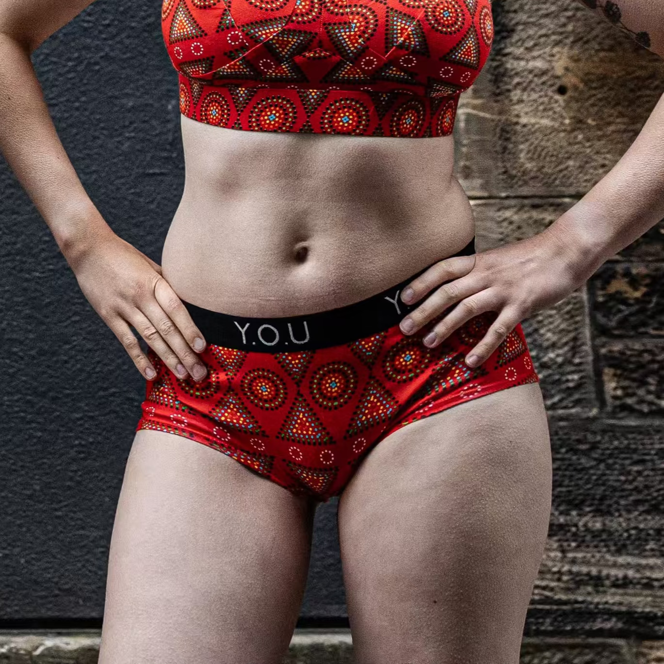 model wearing organic cotton YOU branded boy shorts in red mara - You Underwear