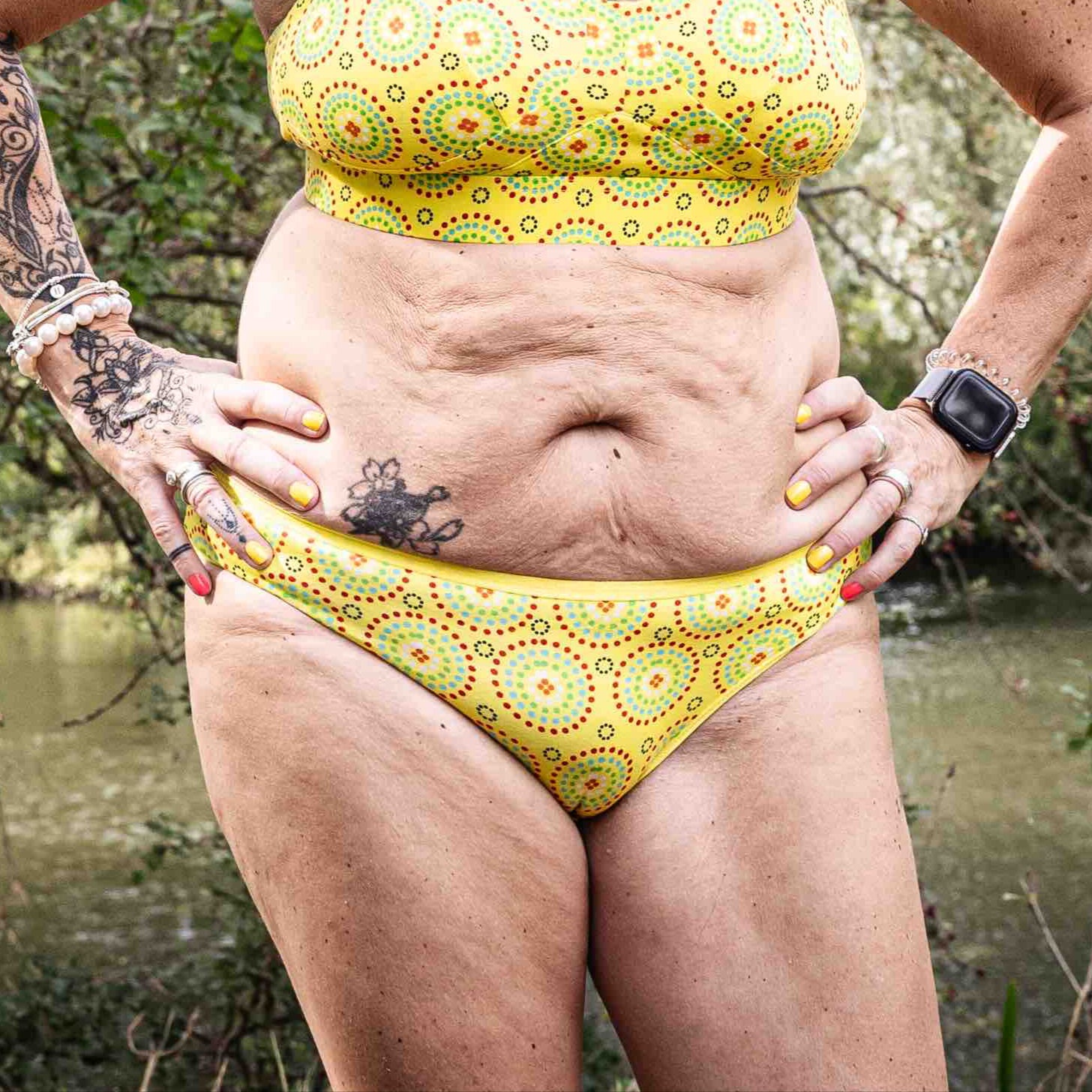 model wearing organic cotton low rise bikini yellow mara print - You Underwear