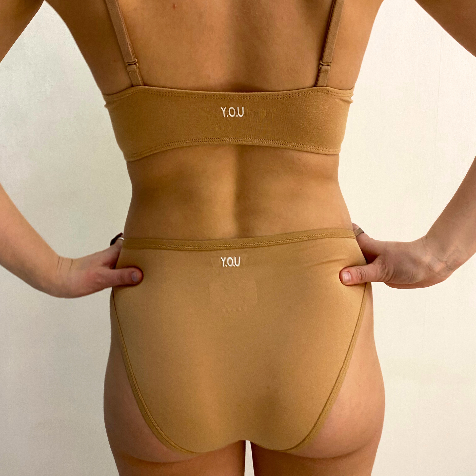 Women's organic cotton matching bralette and mid-rise bikini set - almond (light nude)