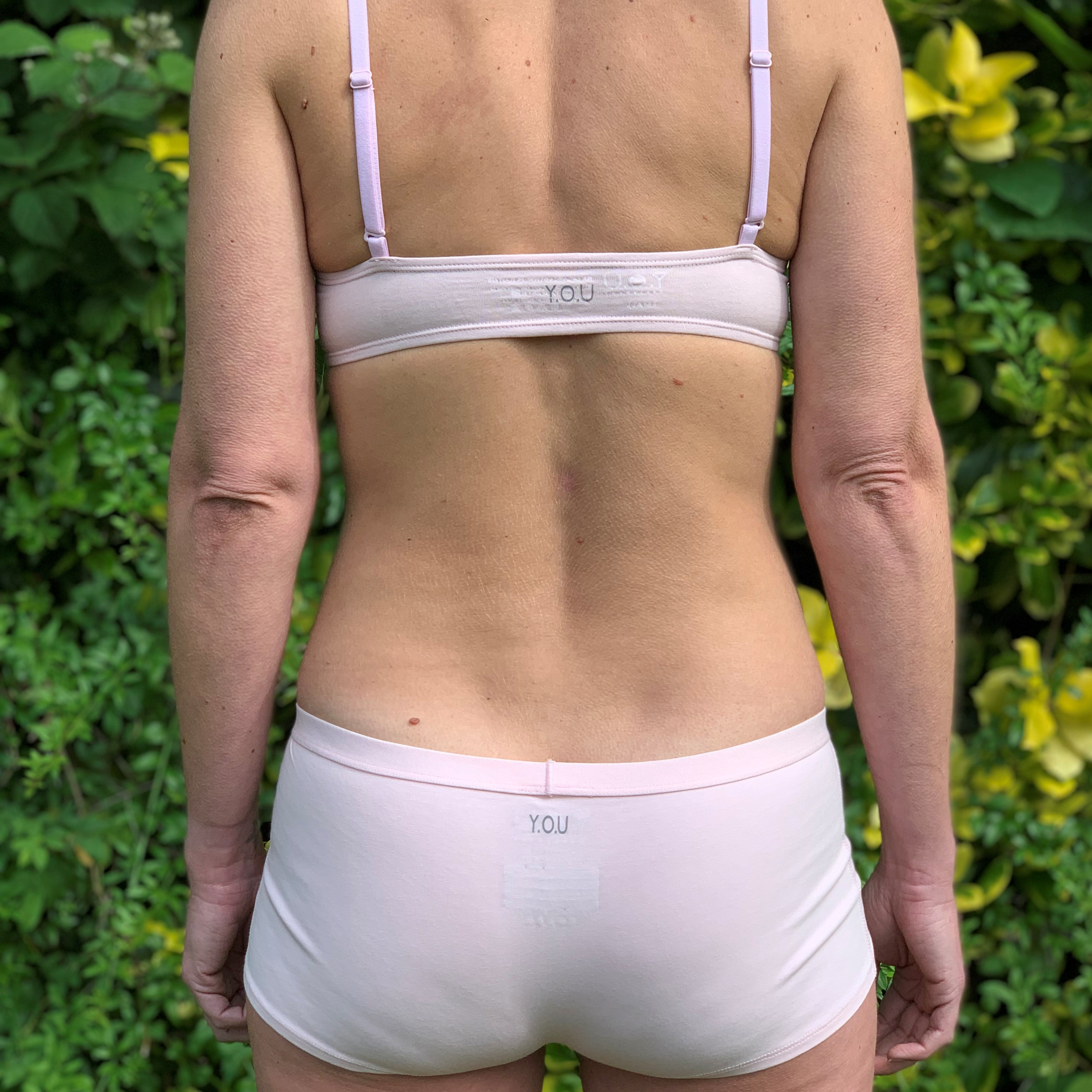 Women's organic cotton matching bralette and boy shorts set in light pink