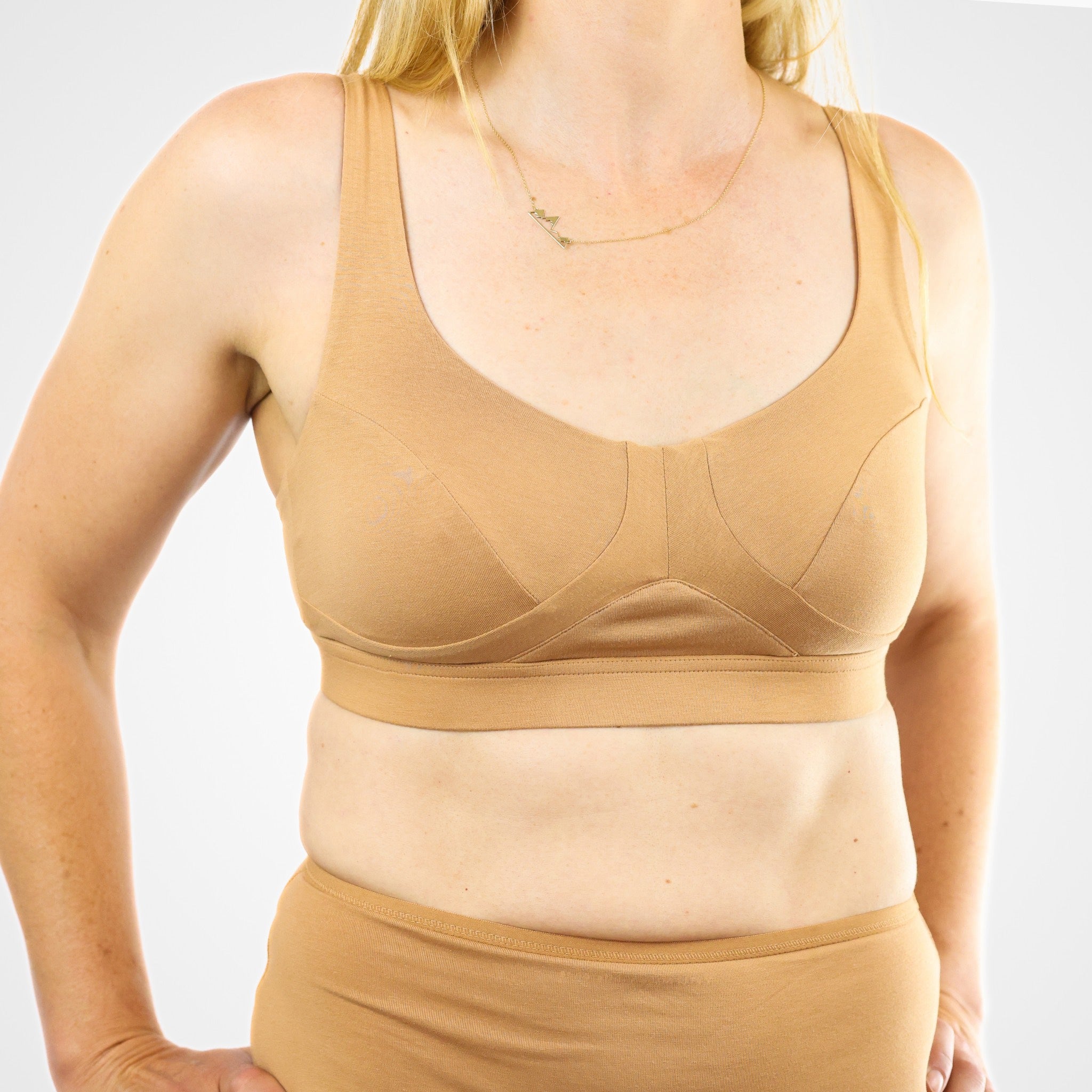 model wearing organic cotton more supportive bra almond - You Underwear