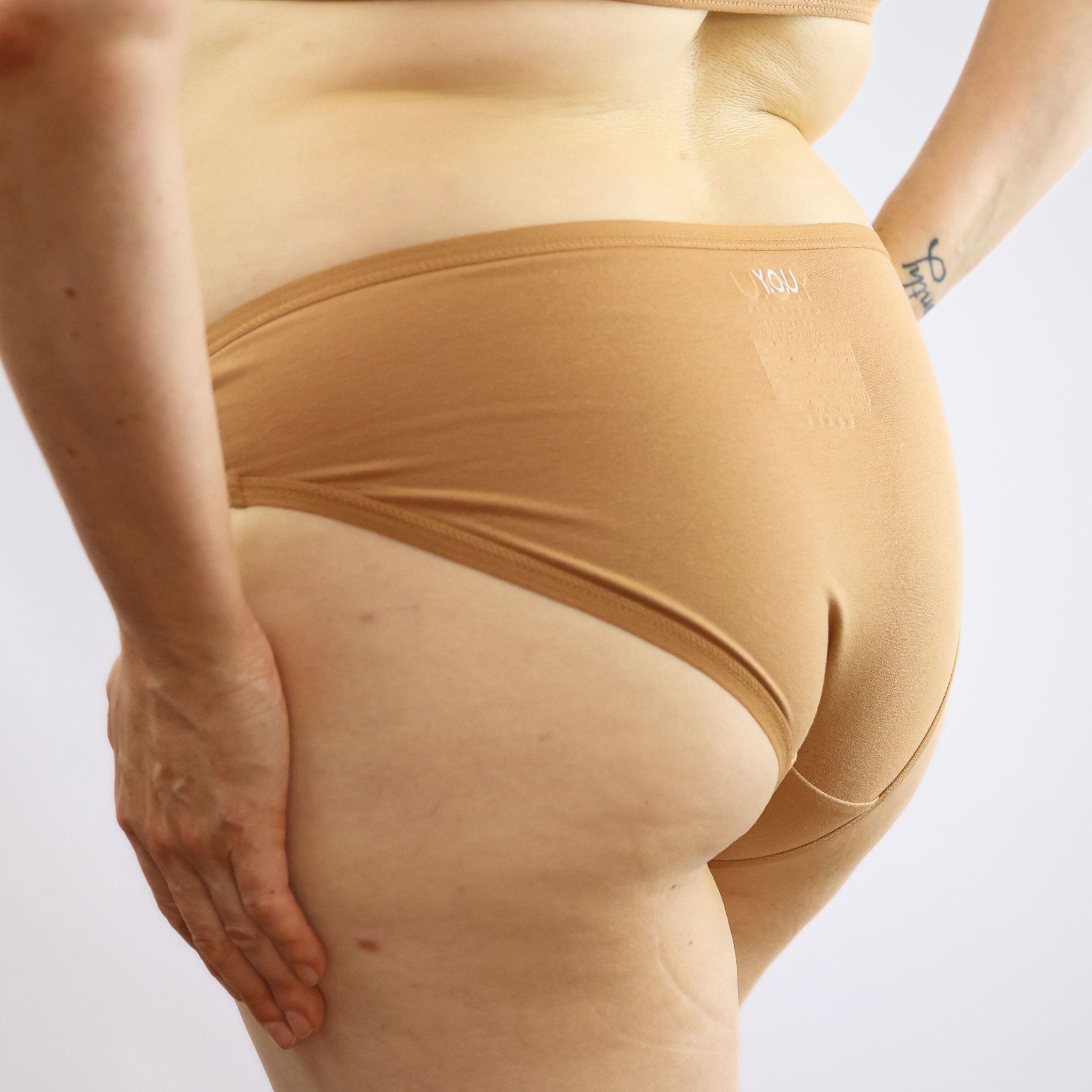 Women's organic cotton low - rise bikini bottoms in almond (light nude) - Y.O.U underwear