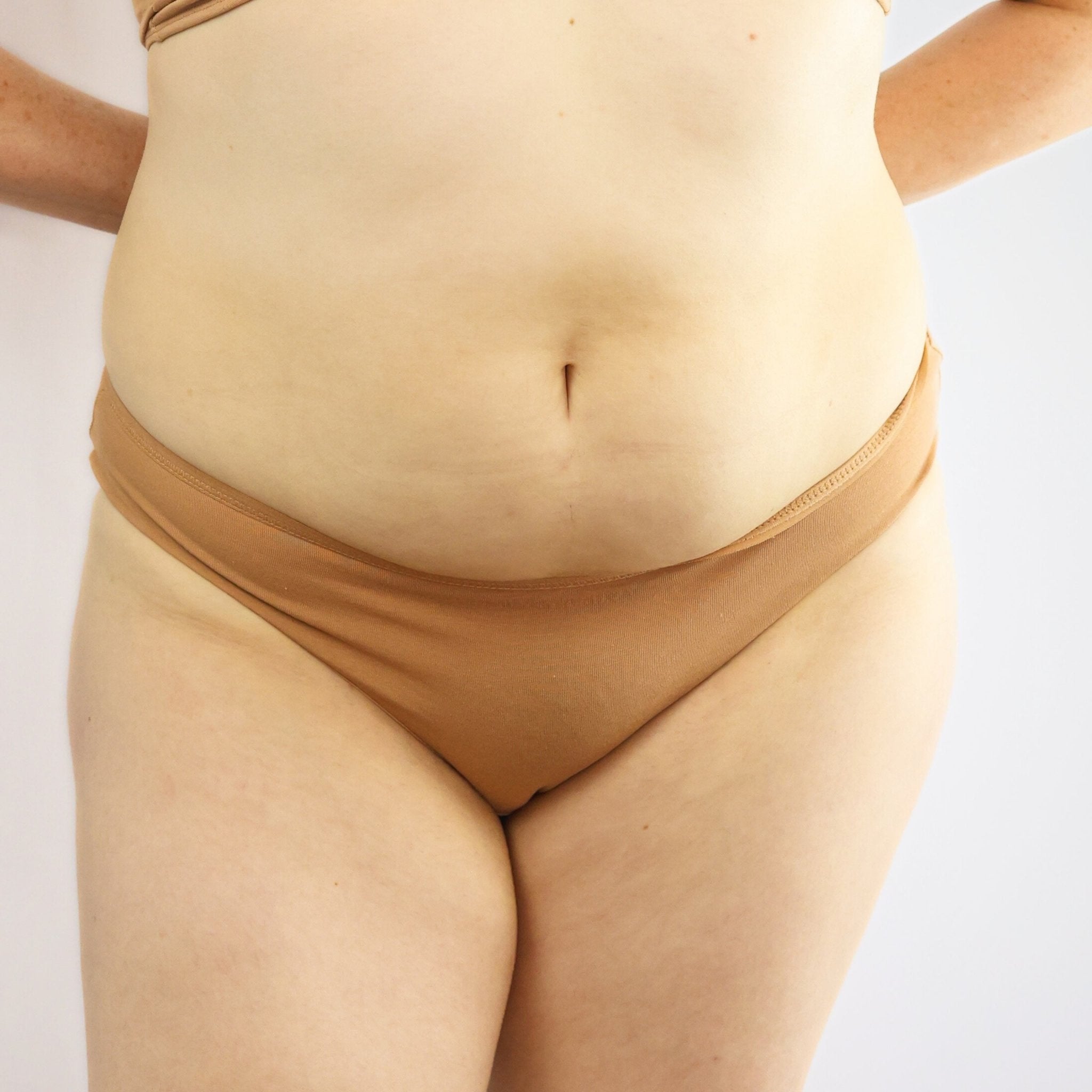 Women's organic cotton low - rise bikini bottoms in almond (light nude) - Y.O.U underwear