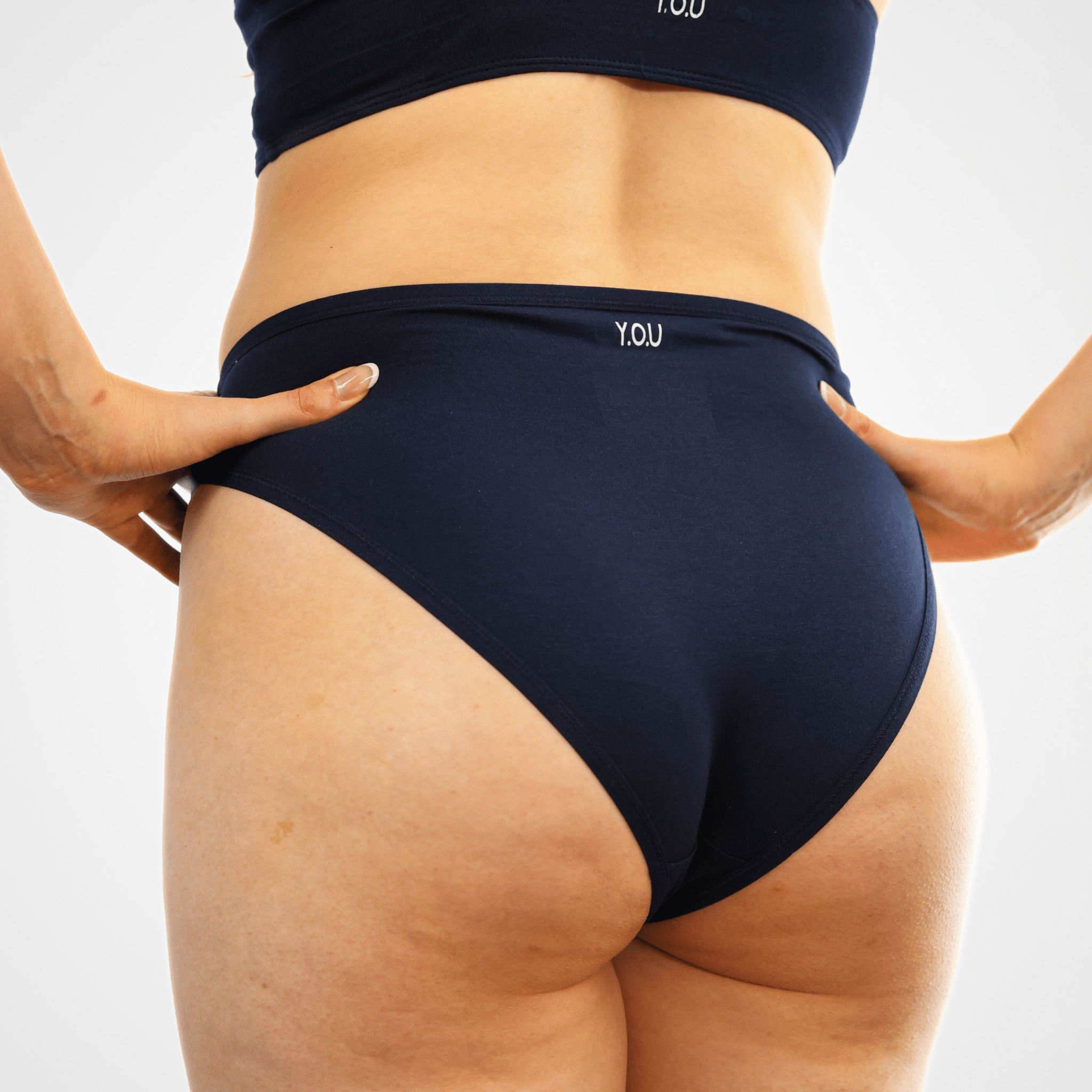 Women's organic cotton mid - rise bikini bottoms in navy blue - Y.O.U underwear