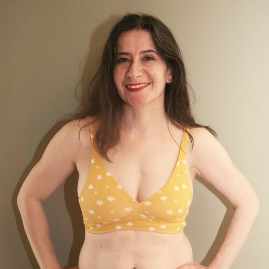 Women's organic cotton bralette in a yellow with white flowers pattern