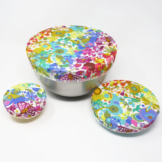 3 bowls with brightly coloured paradise biodegradable bowl covers