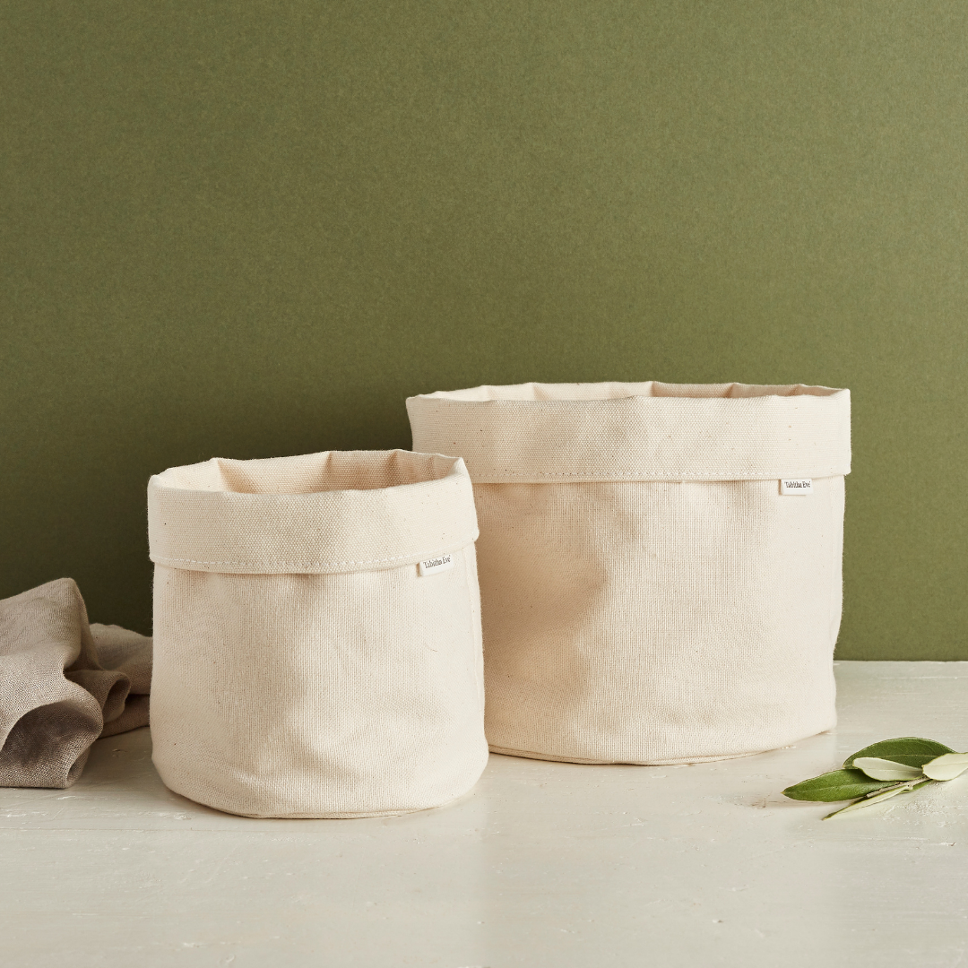 2 different sized neutral coloured canvas buckets