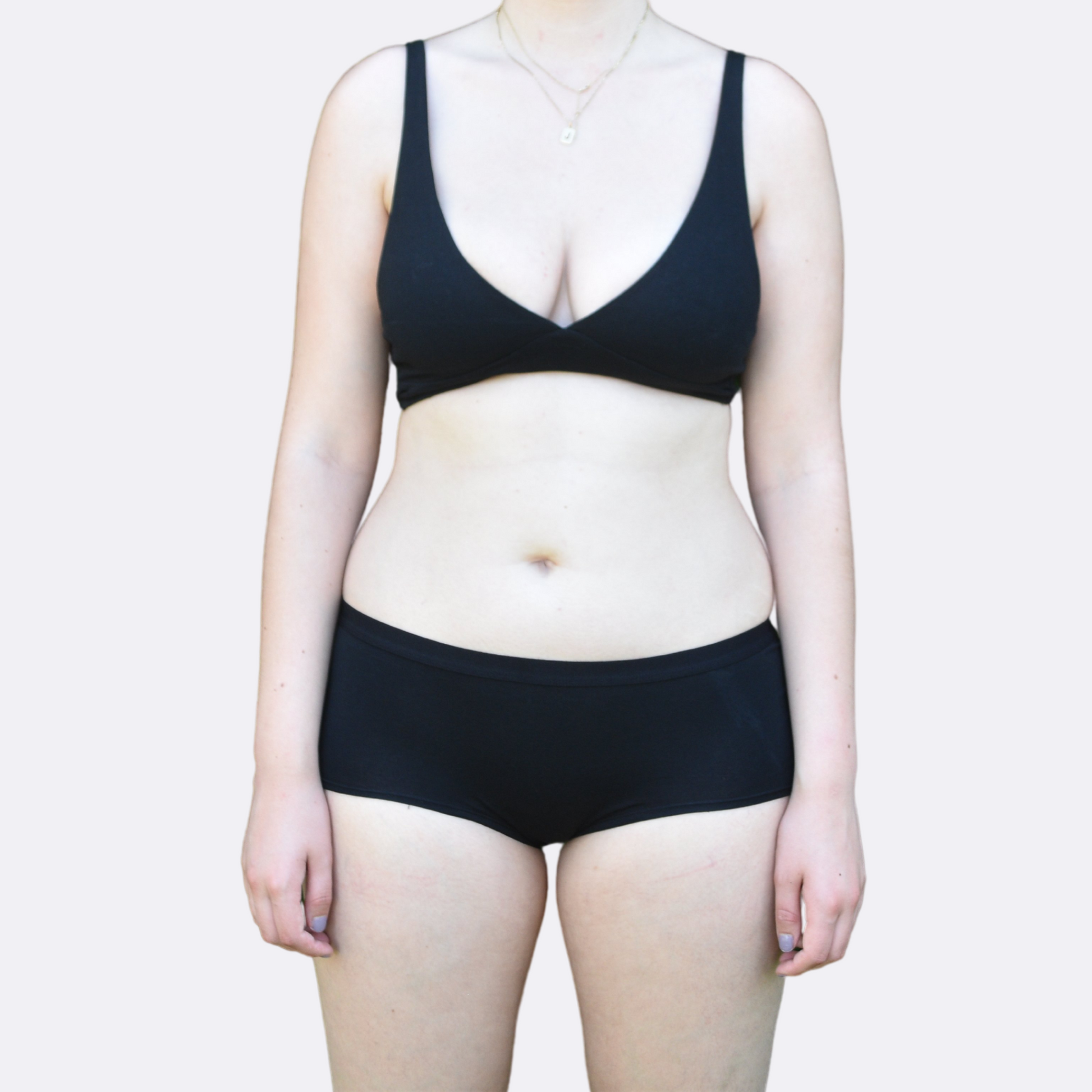 Women's black bralette and plain boy shorts - front view 