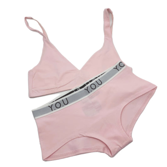 Women's organic cotton matching bralette and Y.O.U boy shorts set in light pink