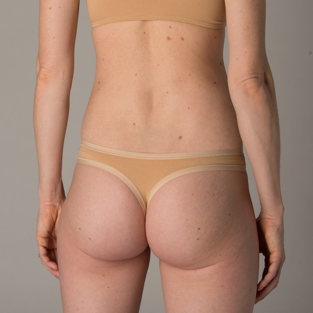 Women's almond thong - back view