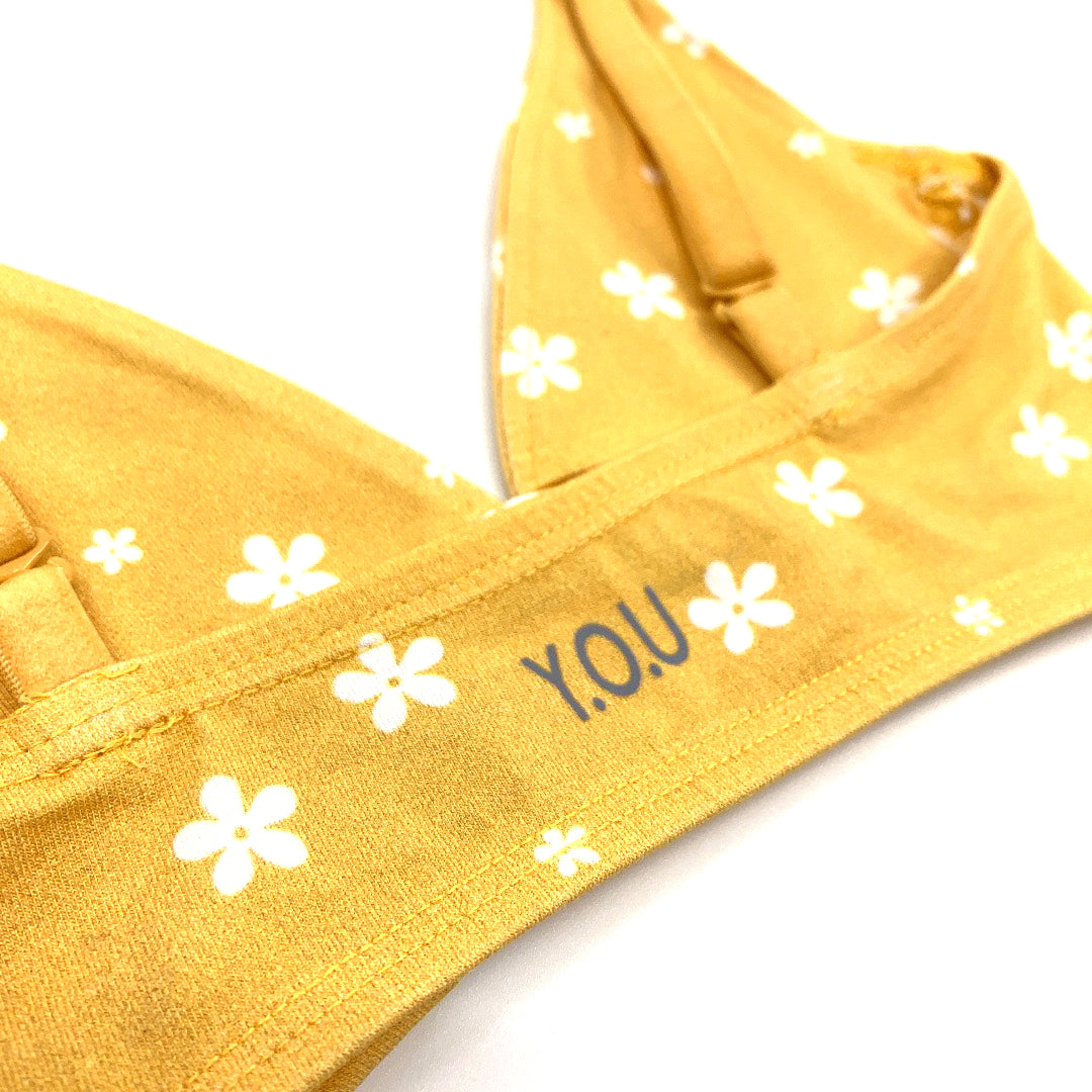 Women's organic cotton bralette in a yellow with white flowers pattern