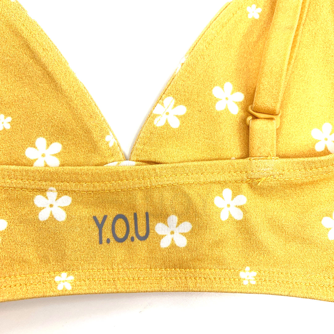 Women's organic cotton bralette in a yellow with white flowers pattern