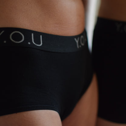 Women’s organic cotton boy shorts with Y.O.U elastic in black