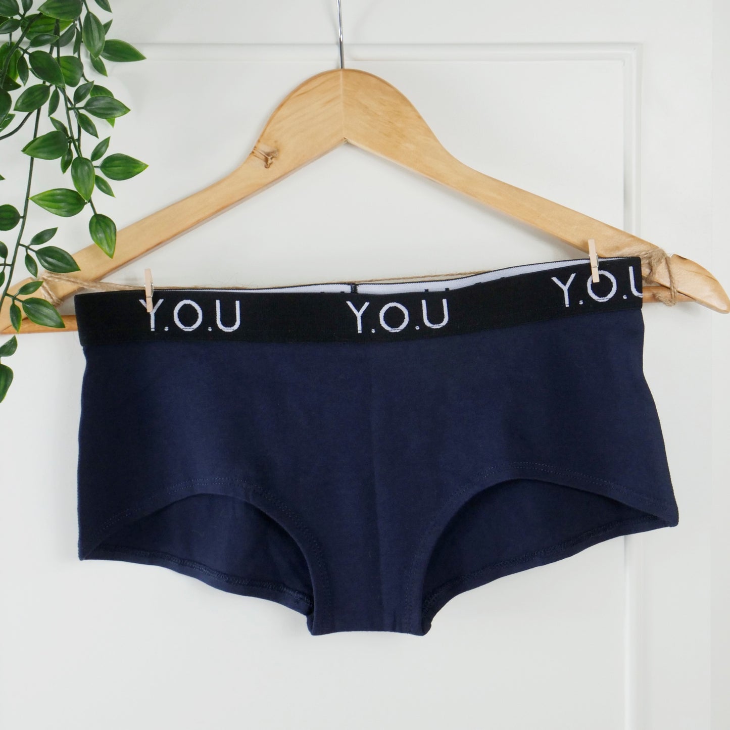 Women’s organic cotton boy shorts with Y.O.U elastic in navy blue