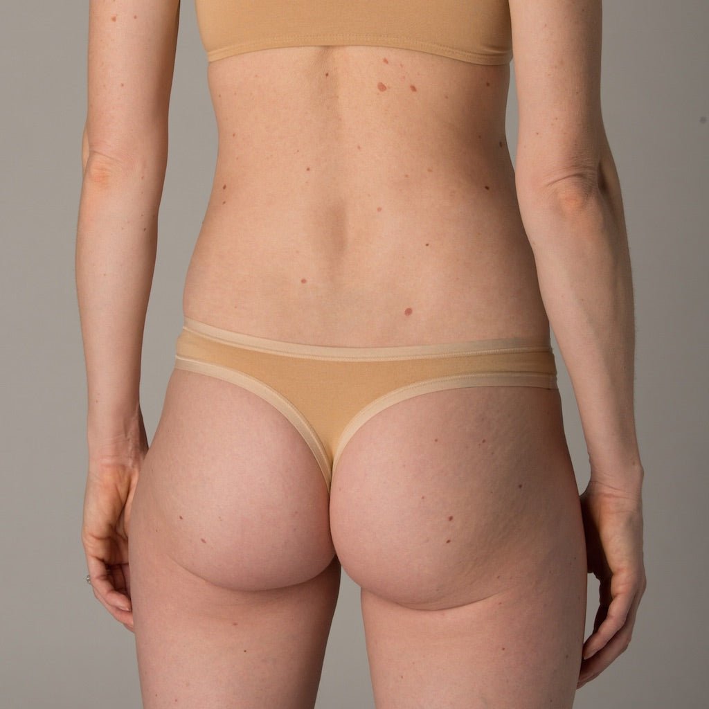 Women's organic cotton thong in almond (light nude) - Y.O.U underwear